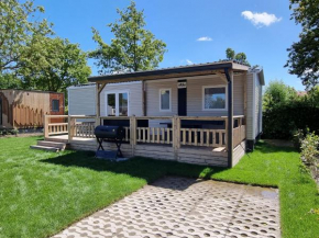 Nieuw chalet Renesse met grote tuin, drie slaapkamers en op loopafstand van strand en centrum!